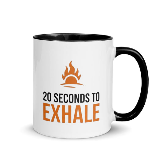 11 oz white ceramic mug with black handle and black interior with 20 seconds to exhale in black and orange font and signature flare above text
